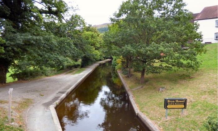 A scenic view of the Llangollen canal at the foot of the Bryn Howell, Llangollen.